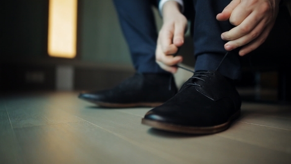 Groom Tying Shoelaces, Stock Footage | VideoHive