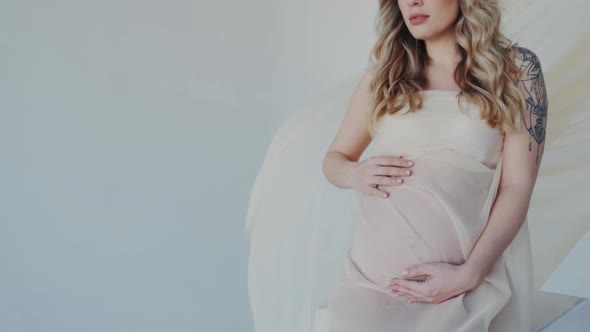 Closeup of Maternity Tummy or Potbelly alt