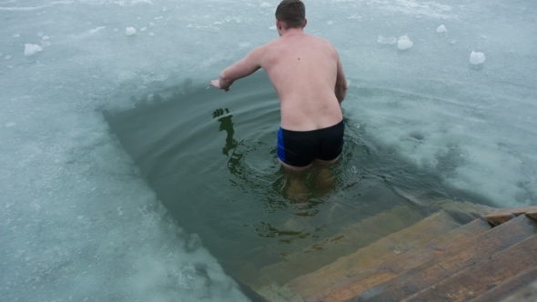Man Swimming In a Ice-hole, Stock Footage | VideoHive