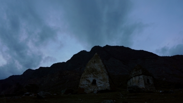 Ancient Dolmen in The Background Of Dark Clouds alt