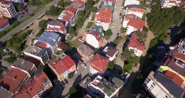 Drone Aerial View of the Red Roofs with Solar Panels on the South of Bulgaria