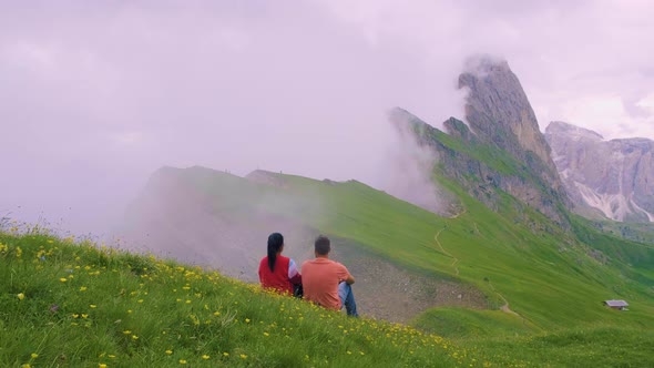 Couple on Vacation Hiking in the Italien Dolomites Amazing View on Seceda Peak alt