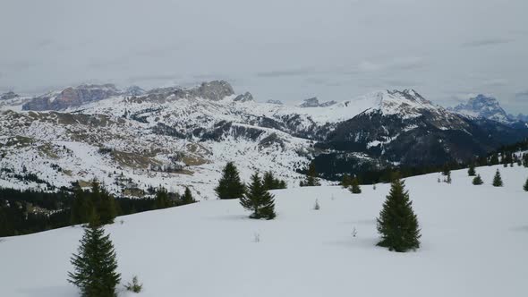 Aerial, Winter Landscape In Dolomites Mountains On A Cloudy Day In Italy