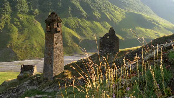 Caucasus Mountains in Tusheti, Georgia. Ruins and the Old Tusheti Tower. Almost Dried Out Stream in alt