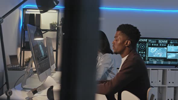 Engineers Working on Computers in Office alt