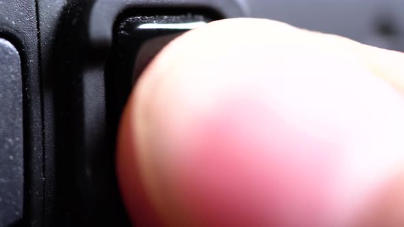 Macro of Record Button on a Camera Getting Pressed alt