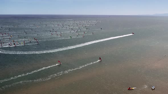 Aerial View Of Windsurfers Racing On Mediterranean Coast Near Gruissan