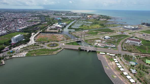 aerial view of the ocean and river in Makassar city Sulawesi Indonesia during a sunny day with build alt
