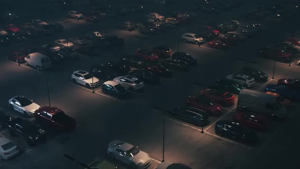 Night Outdoor Parking Lot. Busy Parking Lot At The Night alt