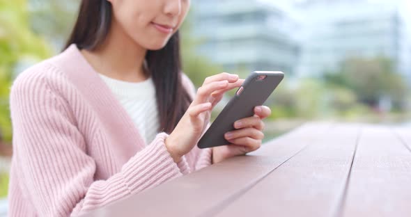 Woman use of smart phone alt