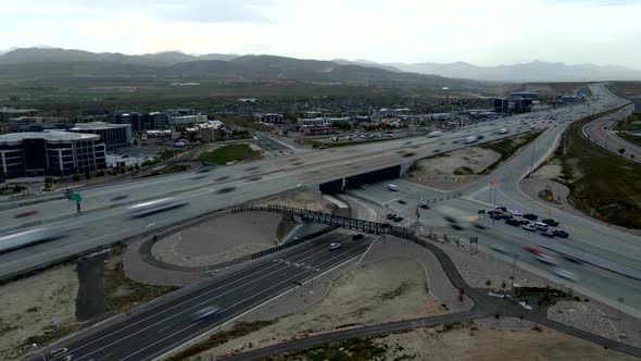 Time lapse of I-15 in Lehi, Utah near Travers Mountain and Thanksgiving Point with traffic speeding alt