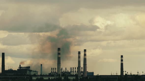 Industry time lapse. Smoking chimneys footage.