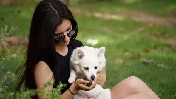 Beauty Woman Play with Dog