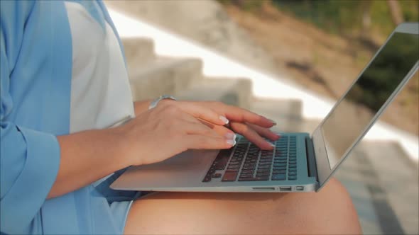 Business Lady Working on the Laptop, Attractive Brunette in a Blue Suit With a Laptop, Attractive alt