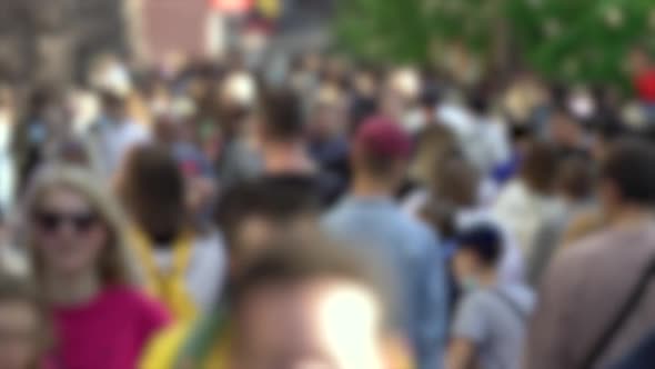 Silhouettes of People Walking in a Crowd Slow Motion alt