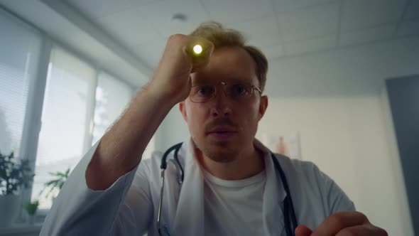 Therapist Checking Reaction Eyes Pupils Pov Video alt