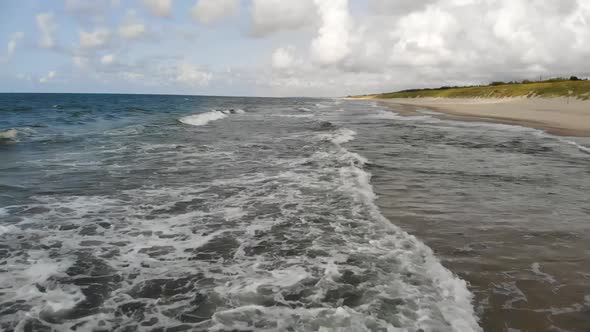 AERIAL: Flying Very Low Above the Blue Sea Waves, alt