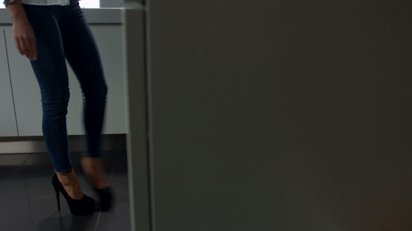 Woman Open The Locker And Take Cereals alt