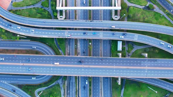 4K : Aerial Hyper lapse drone view of road junction with moving cars. alt