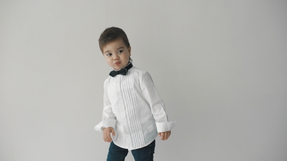 Little Cute Boy In Bowtie Smiling, Making Funny Faces, Stylish Casual Kid alt