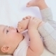 Little Boy Playing With His Foot And Trying To Bite Her - VideoHive Item for Sale