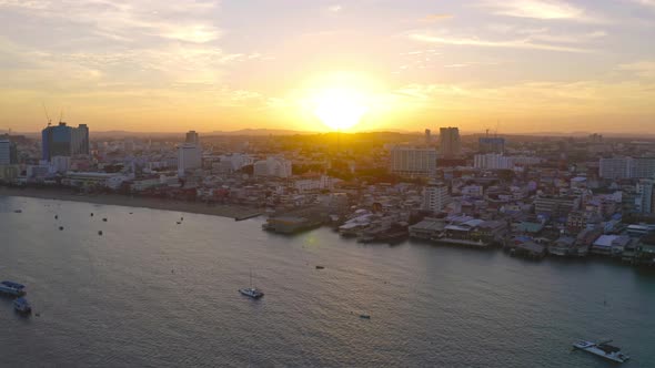 Aerial view of Pattaya sea, beach in Thailand in summer season, urban city with blue sky alt