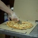 The Chef Uses Roller Knife to Cut Pizza - VideoHive Item for Sale