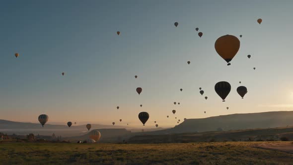 Early Morning Balloons In Cappadocia