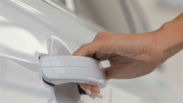 Woman Hand Opening Car Door