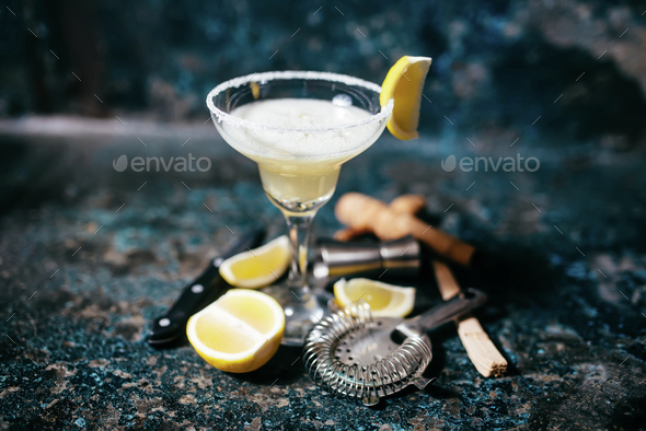Fancy cocktail with lemons and vodka. Margarita refreshment drink and cocktails