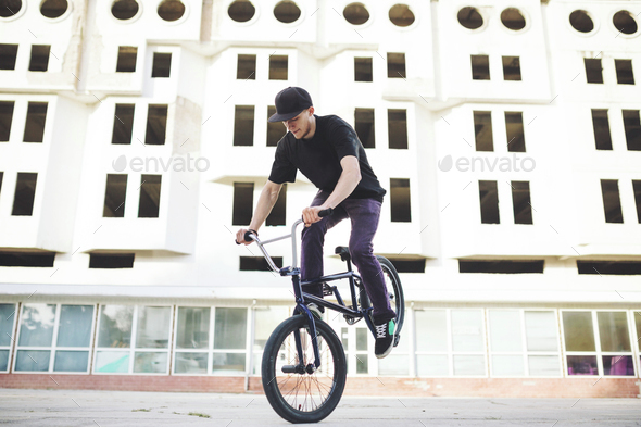 Young BMX bicycle rider Stock Photo by arthurhidden | PhotoDune