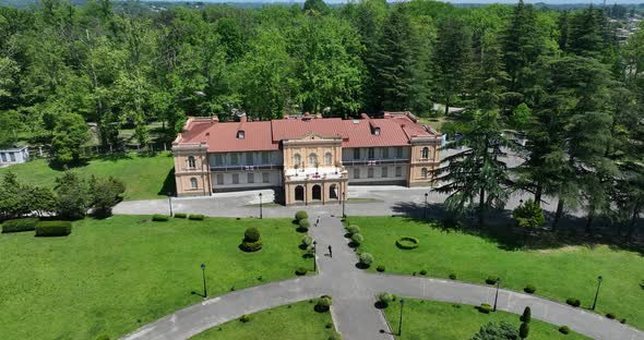 Zugdidi, Georgia - May 30 2022: Aerial view of Dadiani Palace in the center of Zugdidi city alt