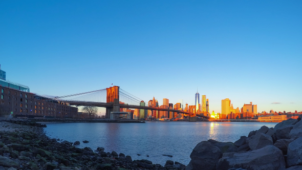 Rocky Shore and the Sunrise over Manhattan alt