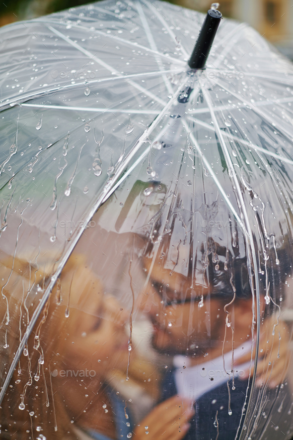 Raindrops on umbrella Stock Photo by Pressmaster PhotoDune