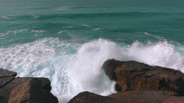 Ocean Waves Breaking On Rock
