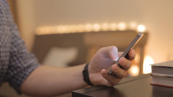  Of a Man's Hand And a Mobile Phone