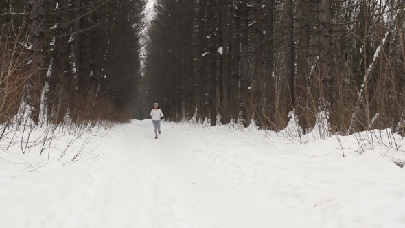 Woman Running Around In The Woods