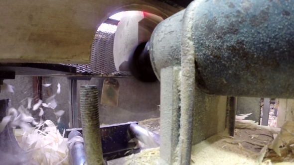 View From Side Of Milling Cutter Sawing Timber