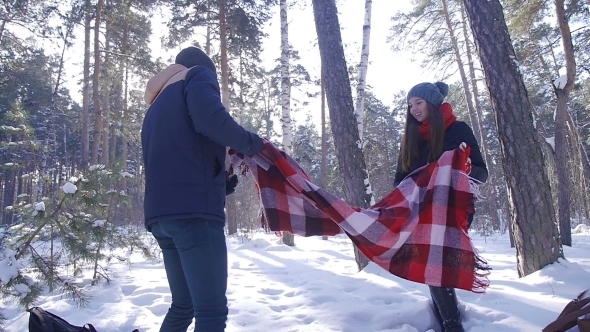 Young And Beautiful Couple In Love Walking In The Winter Woods
