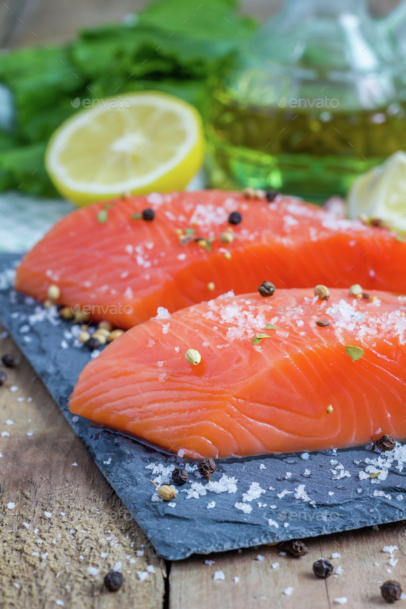 Fresh raw salmon fillet with seasonings Stock Photo by iuliia_n PhotoDune