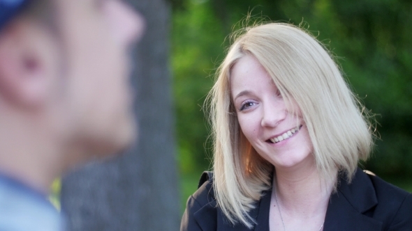 Young Blonde Girl Has Conflict and Talking With Boy alt