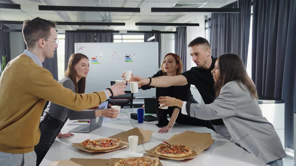 The Team Celebrates the Successful Start of the Project During the Lunch Break alt