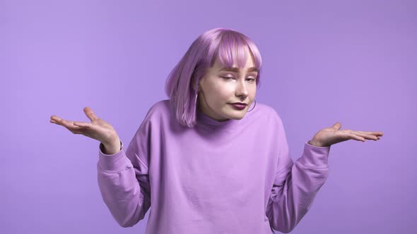 Indifferent Unsure Woman Makes Gesture of I Dont Know Cant Help Anything alt