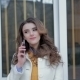 Fasion Lady Calling On The Phone In The Backgroung Of The Window - VideoHive Item for Sale