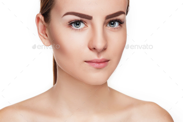 The beautiful face of young woman with cleanf fresh skin - Stock Photo - Images
