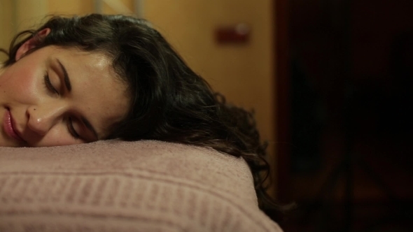 Girl Brunette Lying On a Massage Table And Relaxes