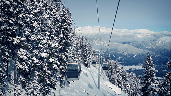 View Moving Up Mountainside With Gondolas alt