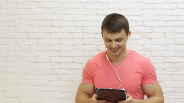 Casual Man Using Tablet Computer Social Network Communication