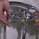 The Man Opens the Tap Water in the Bathroom - VideoHive Item for Sale