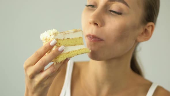 Girl on Diet Eating Cake Eagerly, Temptation, Sweets Cause Acne, Skincare
